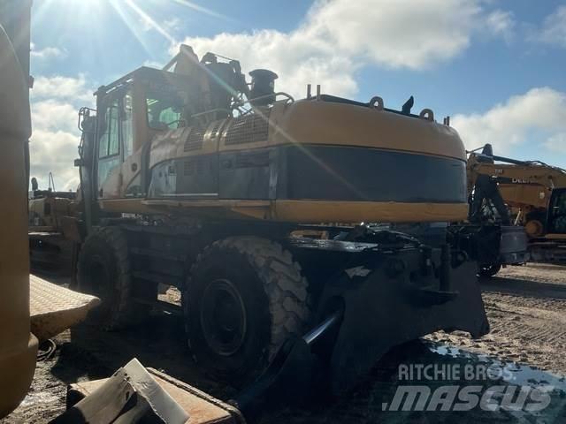 CAT M325CMH Nakladalci za les