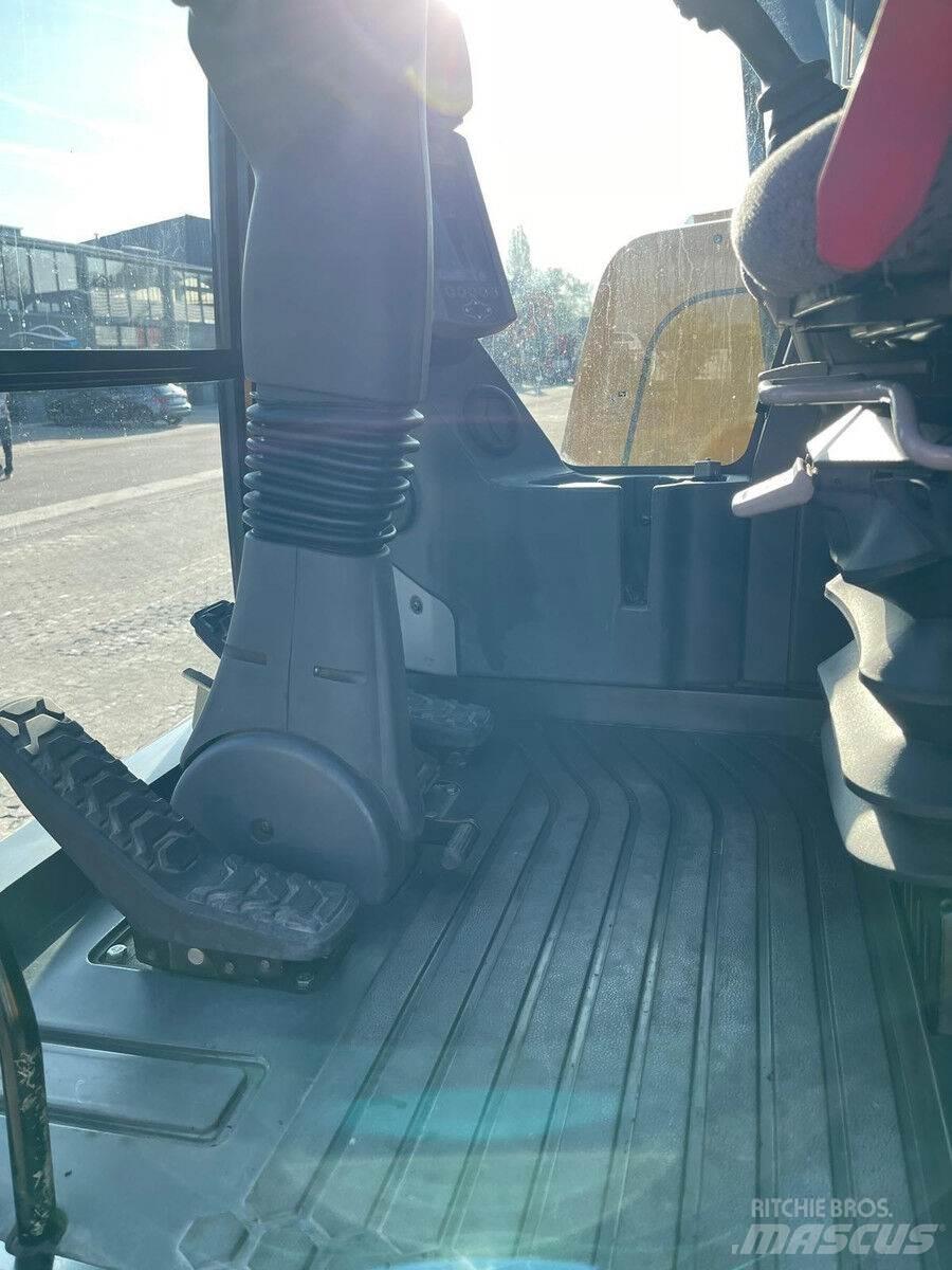 CAT M315F Bagri na kolesih