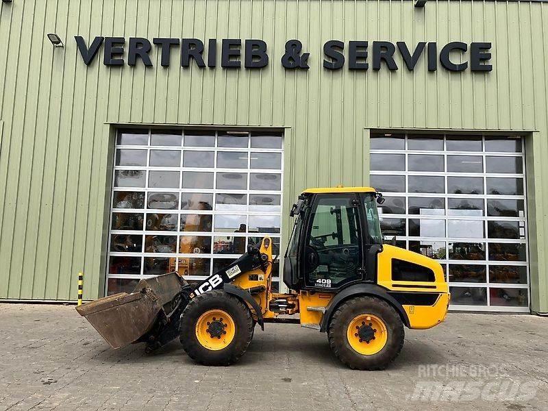 JCB 409 Kolesni nakladalci