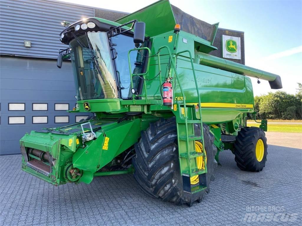 John Deere C670 Kombajni