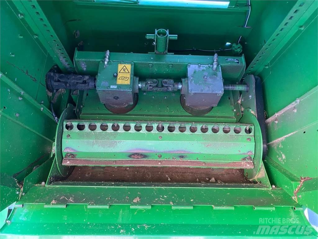 John Deere C670 Kombajni