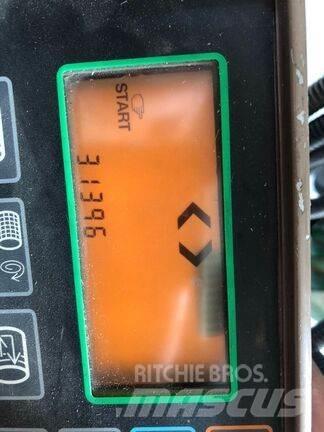 John Deere 590 Balirke (okrogle bale)