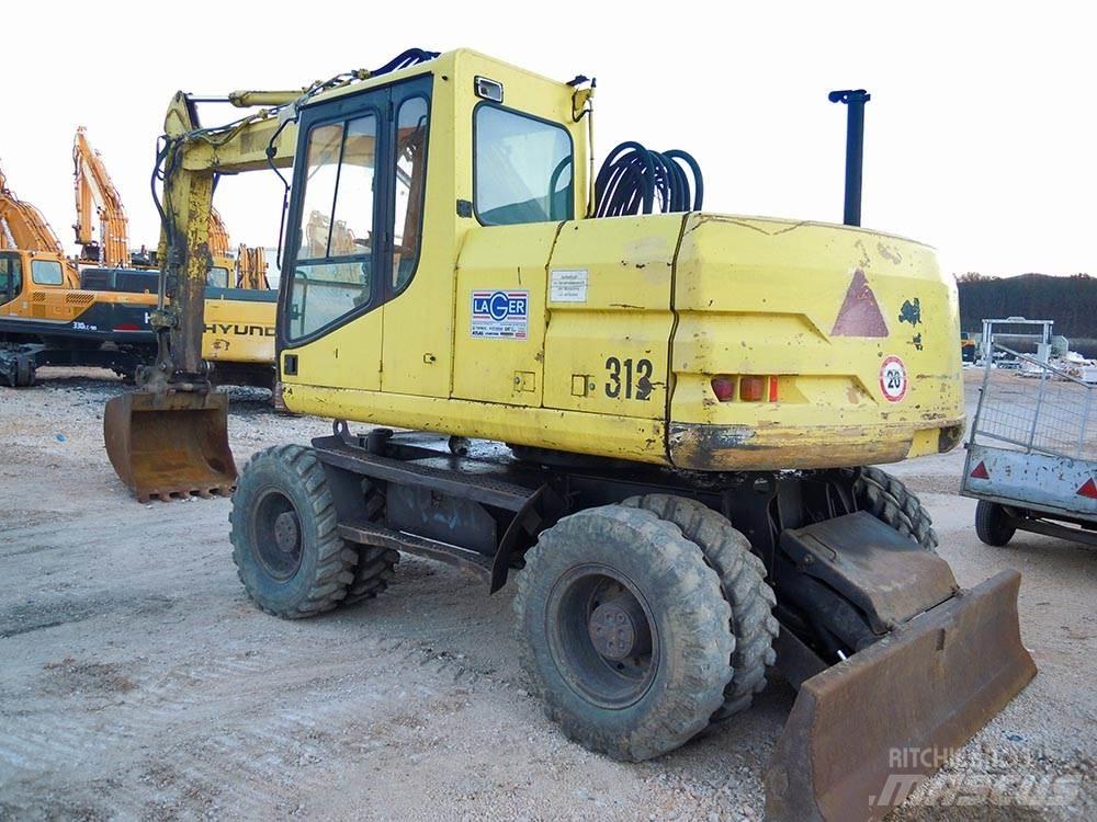 CAT M312 Bagri na kolesih