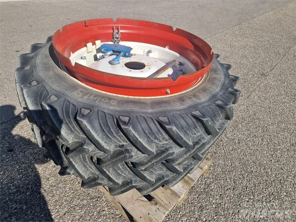 Taurus 12.4 R36 Gume, kolesa in platišča