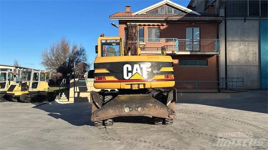CAT M315 Bagri na kolesih