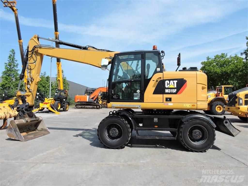 CAT M315 Bagri na kolesih