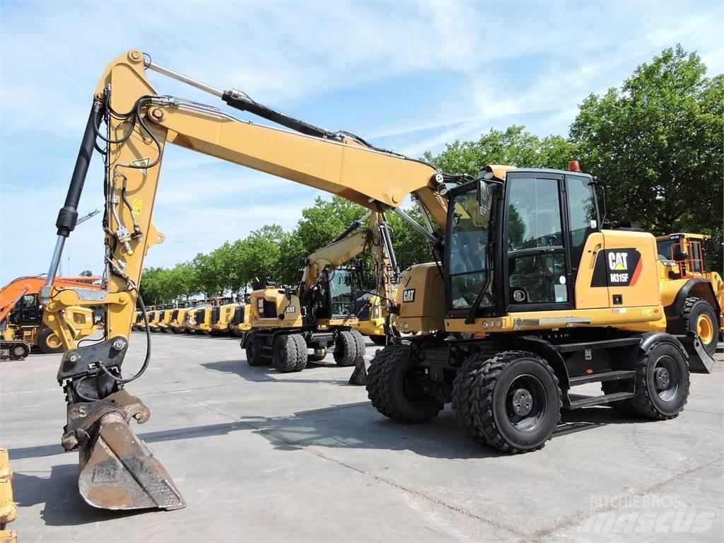CAT M315 Bagri na kolesih
