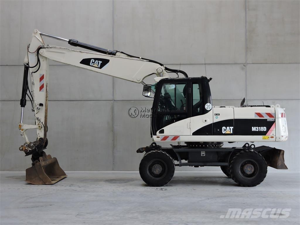 CAT M318D Bagri na kolesih