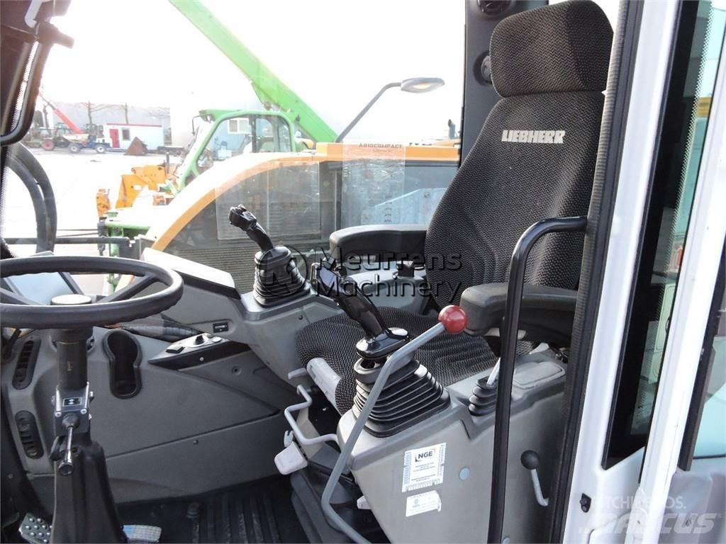 Liebherr A910 Bagri na kolesih