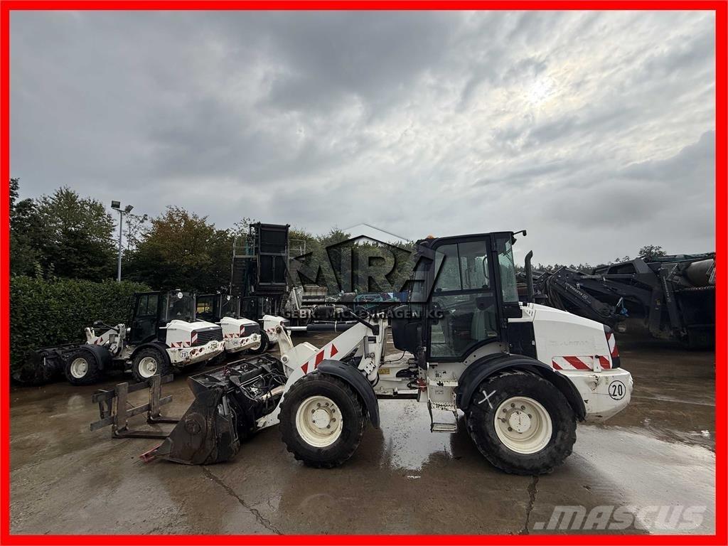 CAT 908M Kolesni nakladalci