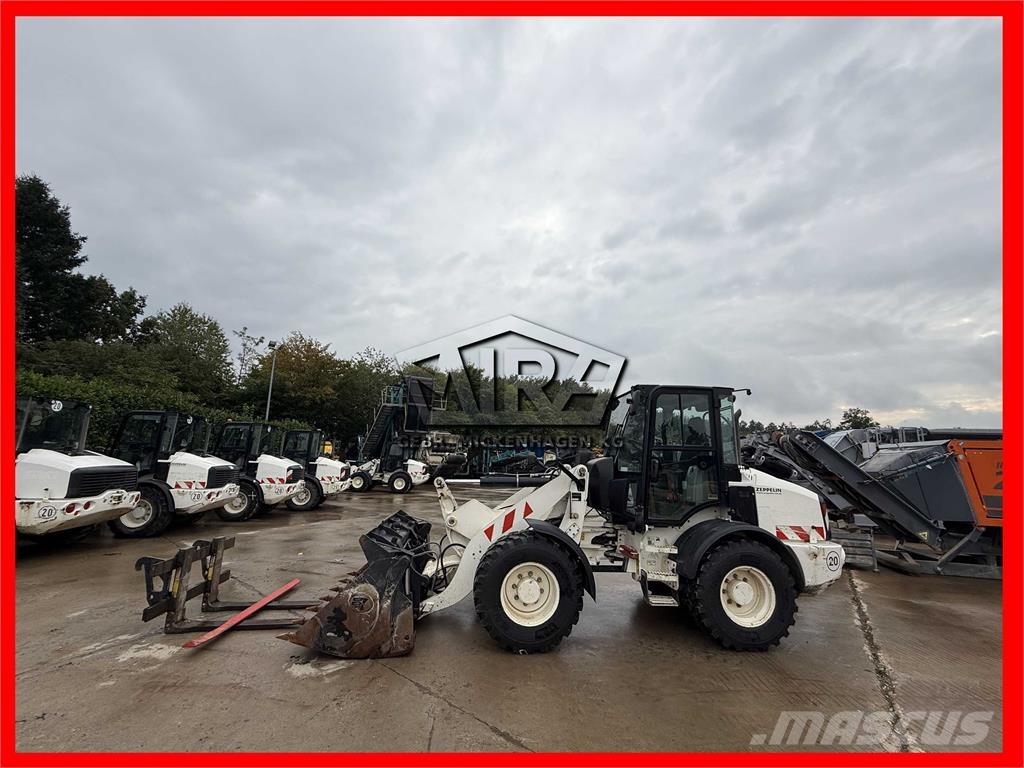 CAT 908M Kolesni nakladalci