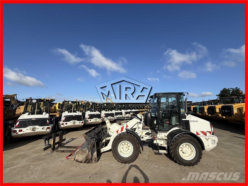 CAT 908M Kolesni nakladalci