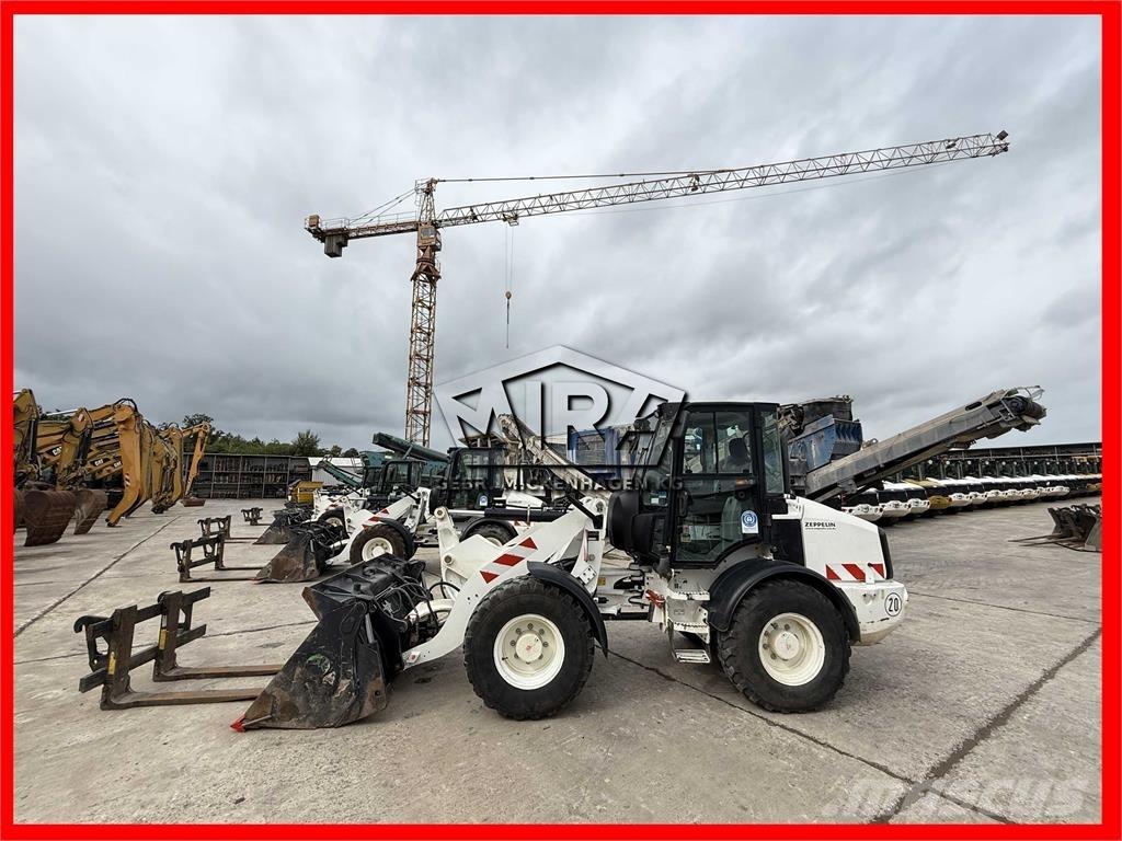 CAT 908M Kolesni nakladalci