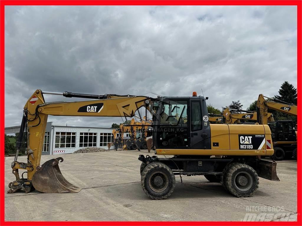 CAT M 318 D Bagri na kolesih