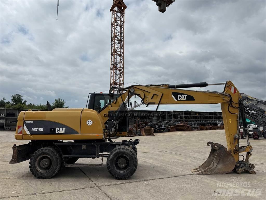 CAT M 318 D Bagri na kolesih