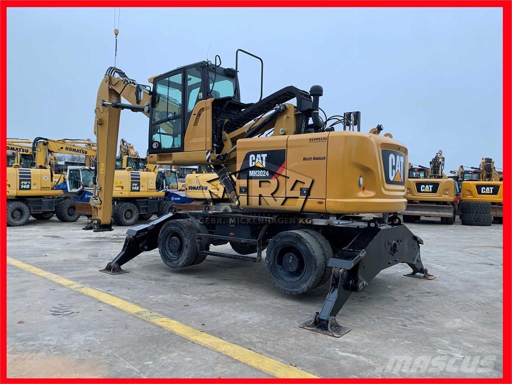 CAT MH3024 Bagri za prekladanje primarnih/sekundarnih surovin