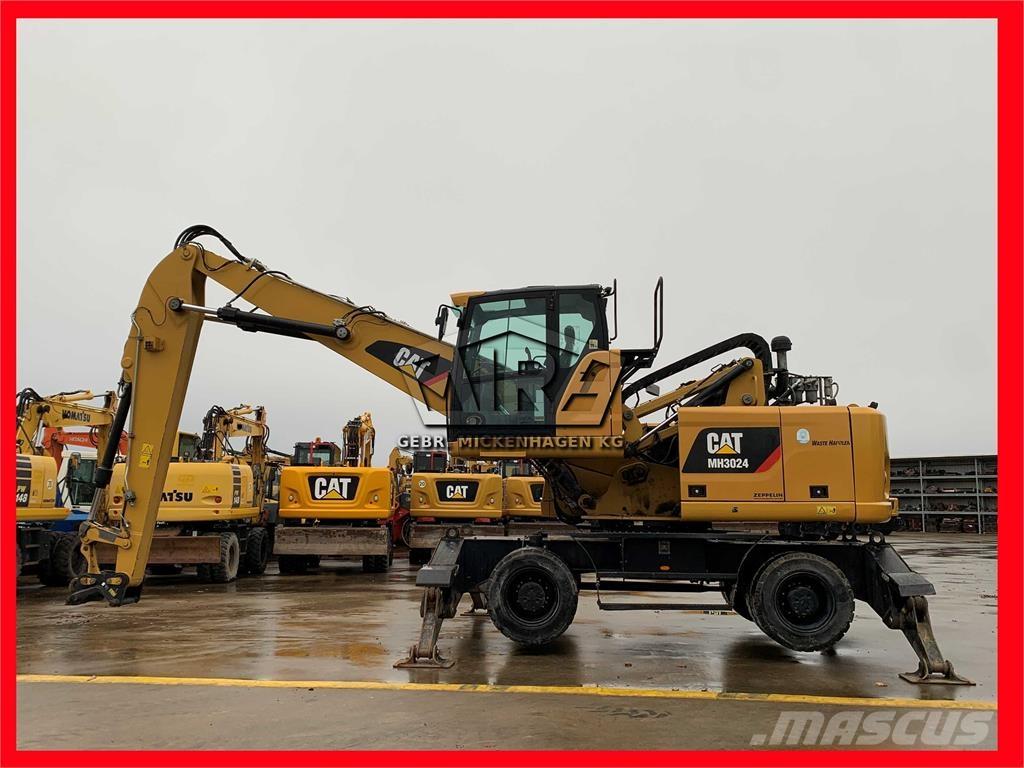 CAT MH3024 Bagri za prekladanje primarnih/sekundarnih surovin