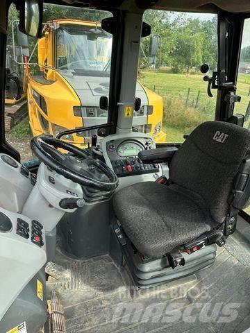 CAT 444 F Rovokopači