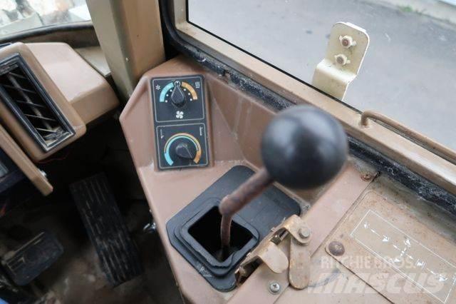 CAT 910 E Kolesni nakladalci