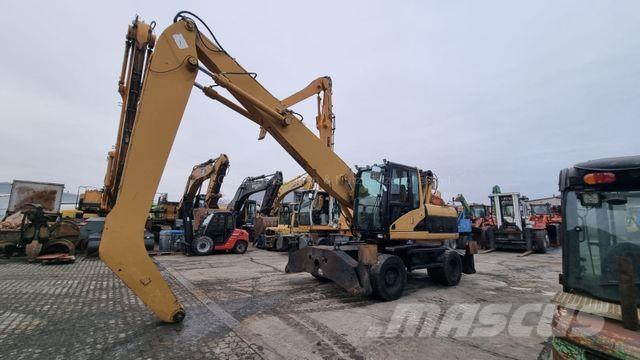 CAT M 318 C / 35 Bagri na kolesih