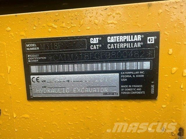 CAT M318F Bagri na kolesih