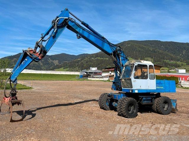 Fuchs 713 Bagri na kolesih
