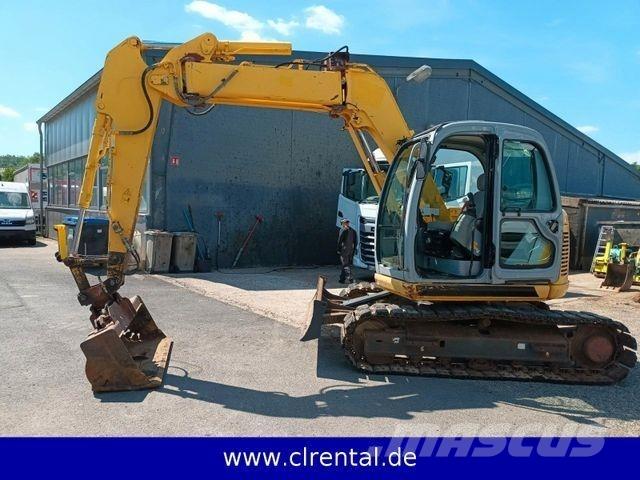 New Holland E70SR 4 Rovokopači