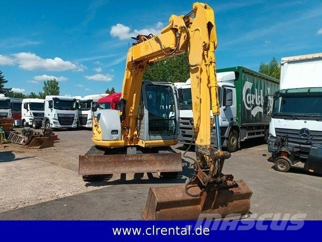 New Holland E70SR 4 Rovokopači