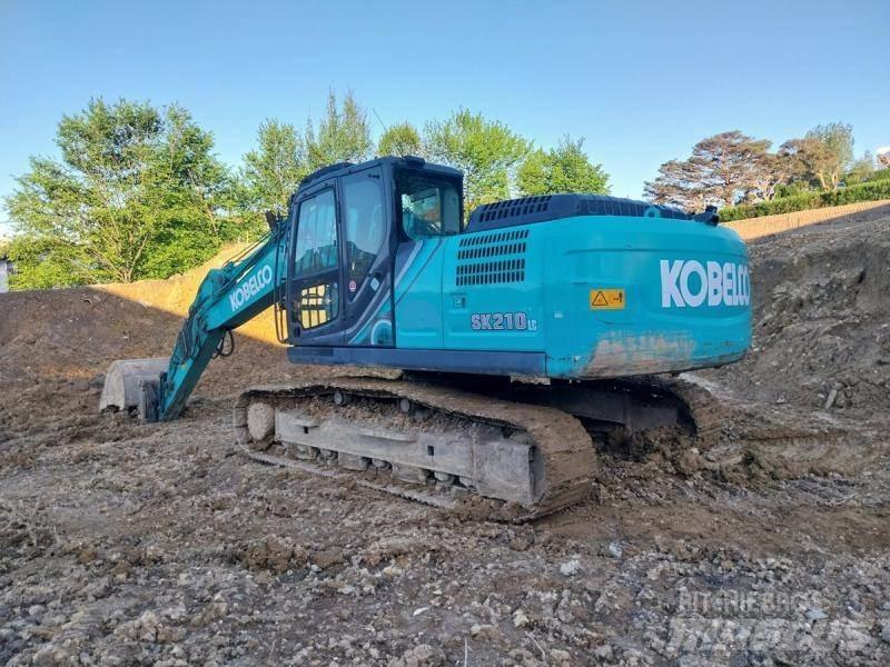 Kobelco SK210 Bagri goseničarji