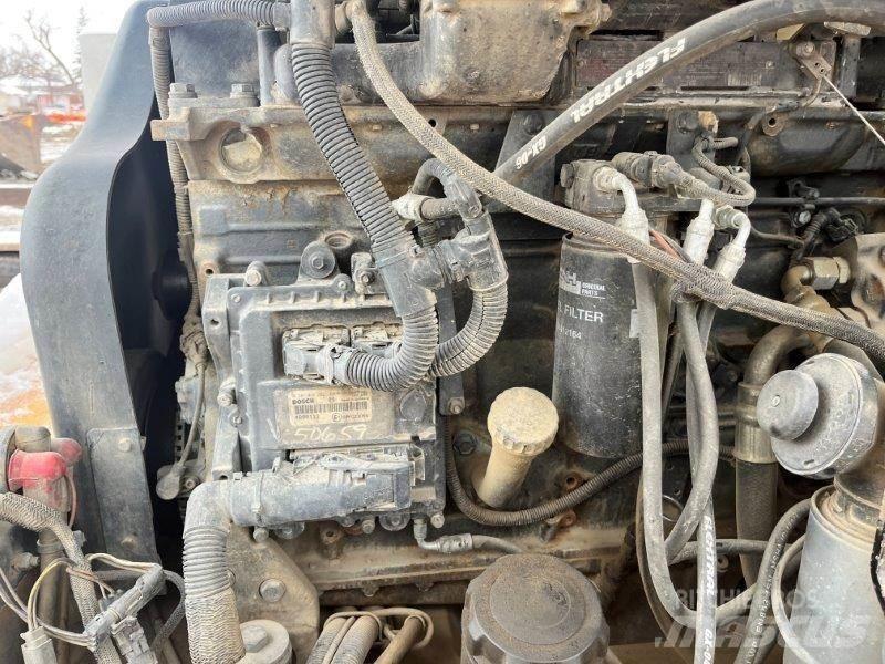 CASE 721D Kolesni nakladalci