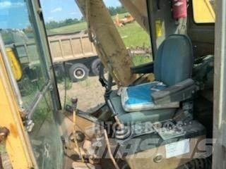 CAT 245 Bagri goseničarji