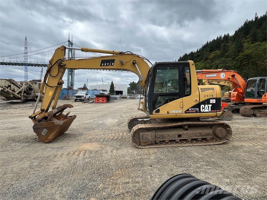 CAT 311C Bagri goseničarji