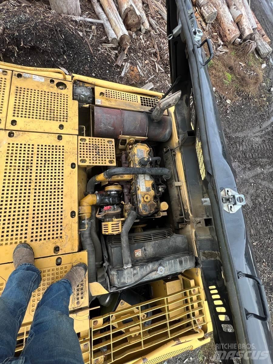 CAT 325C Nakladalci za les