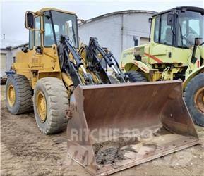 CAT IT18B Kolesni nakladalci