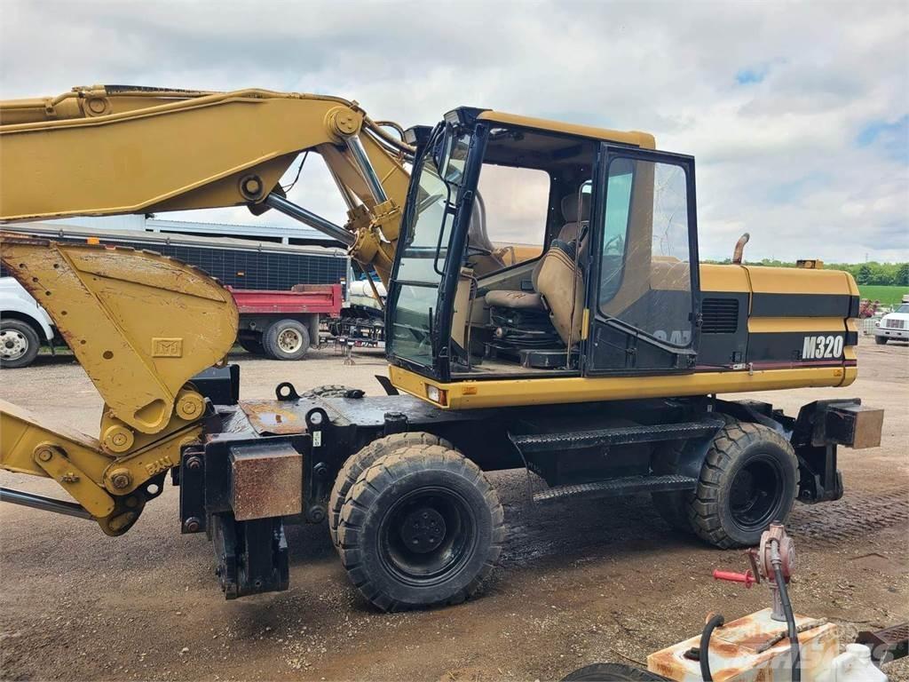 CAT M320 Bagri na kolesih