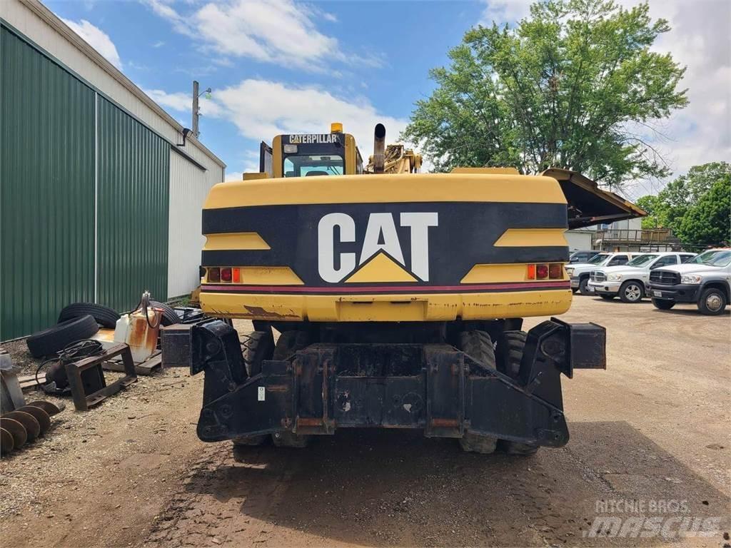 CAT M320 Bagri na kolesih