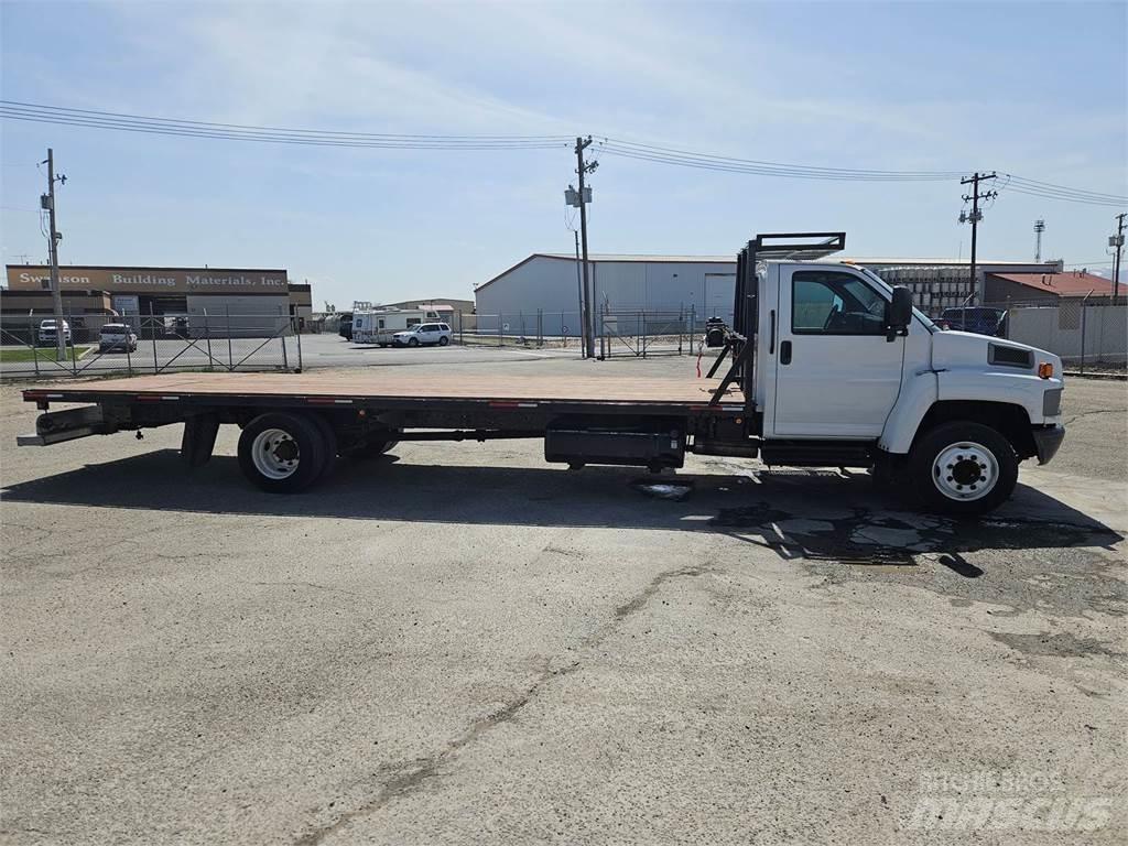 GMC C5500 Tovornjaki s kesonom/platojem