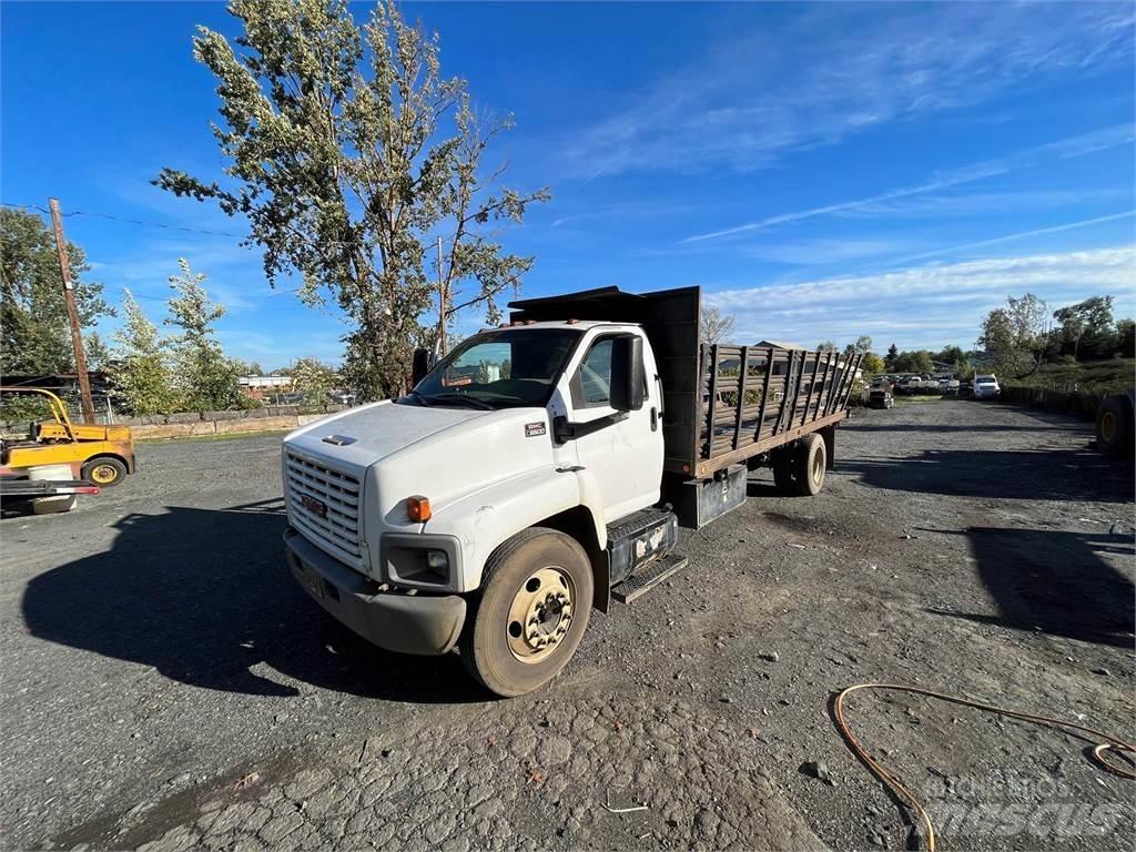 GMC C6500 Tovornjaki s kesonom/platojem