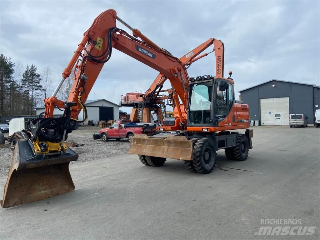 Doosan DX 140W Bagri na kolesih