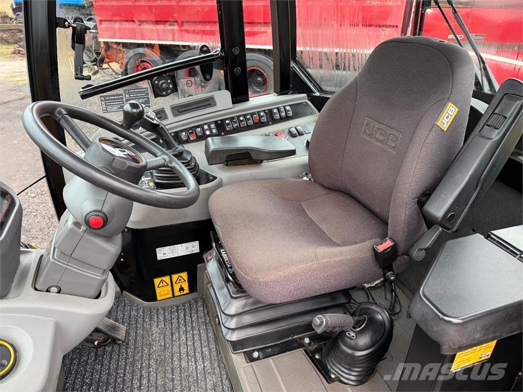 JCB 409 Kolesni nakladalci