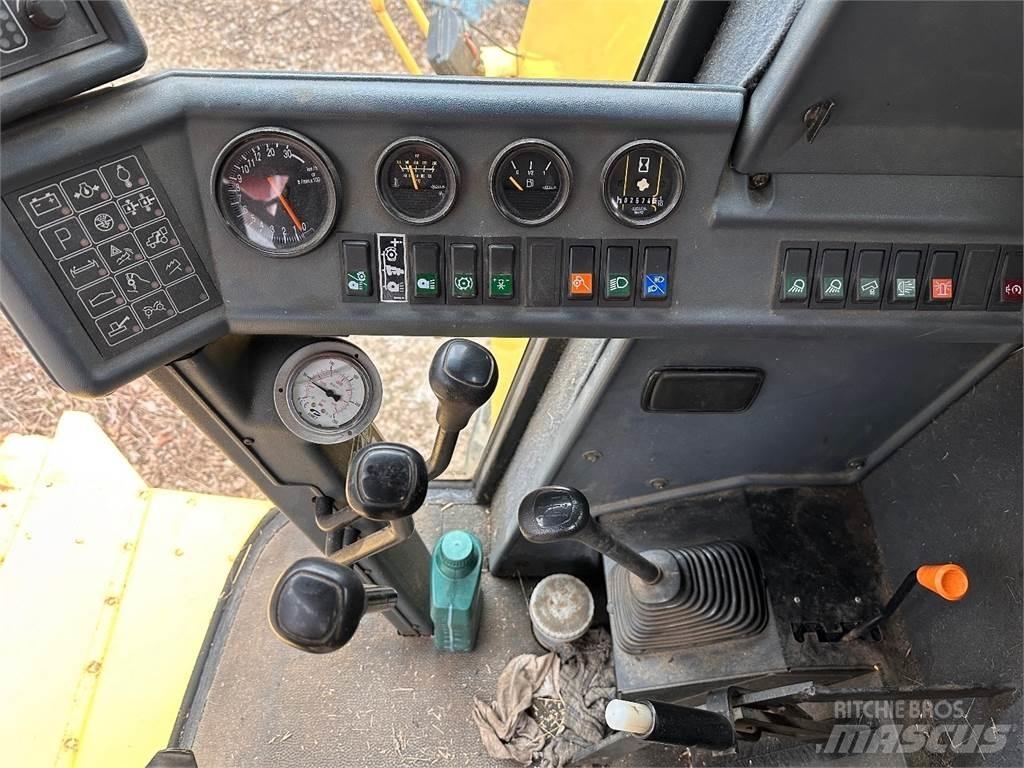 New Holland TC56 Kombajni