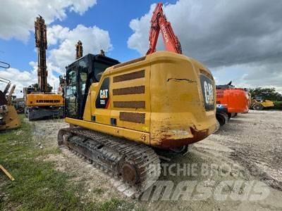 CAT 320 Bagri goseničarji
