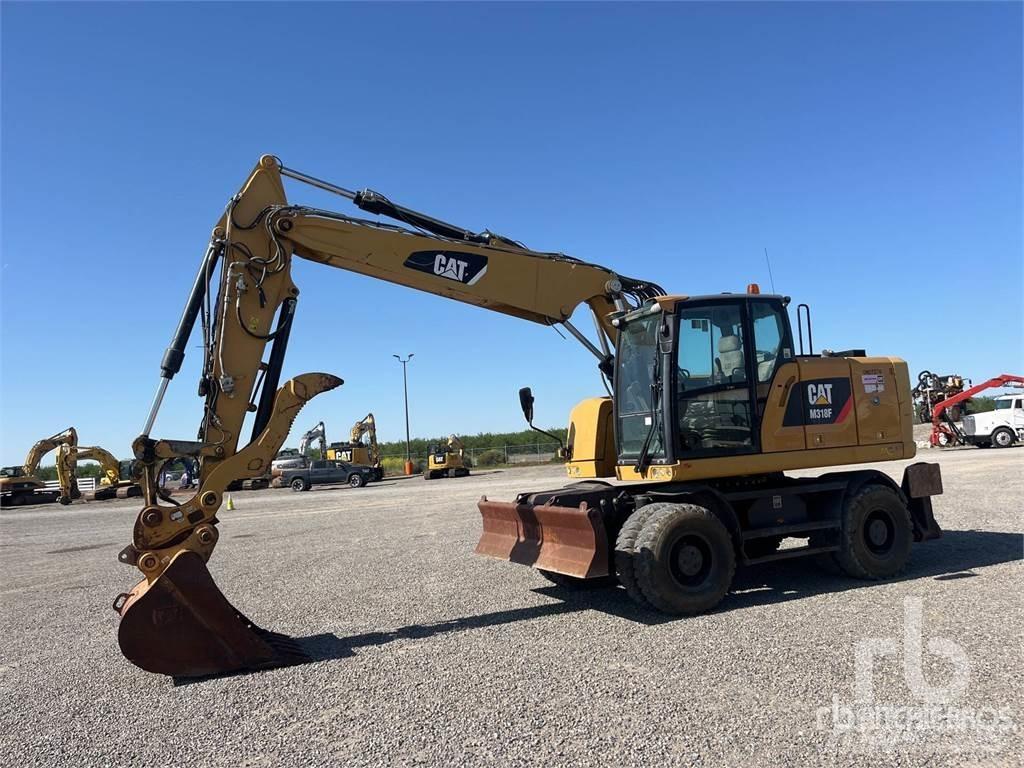CAT M318F Bagri na kolesih