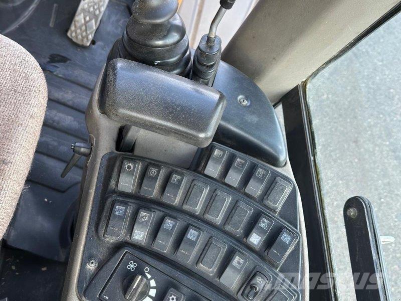 CASE 721 E Kolesni nakladalci