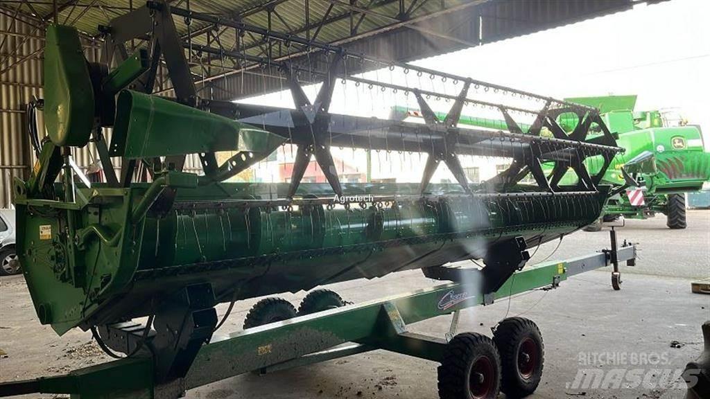 John Deere T 550 Kombajni