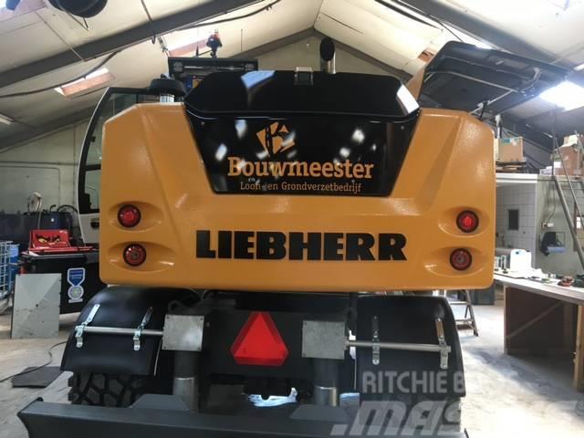 Liebherr A 914 Litronic Bagri na kolesih